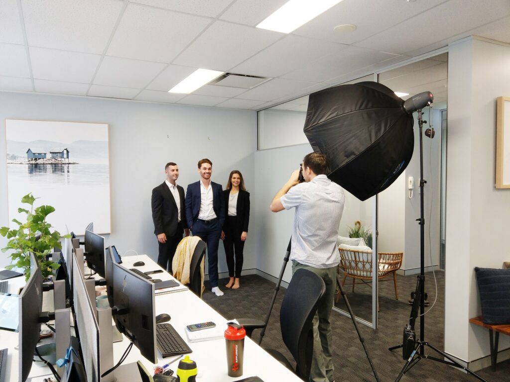 Adrian Harrison working - Corporate team photography behind the scenes shoot.