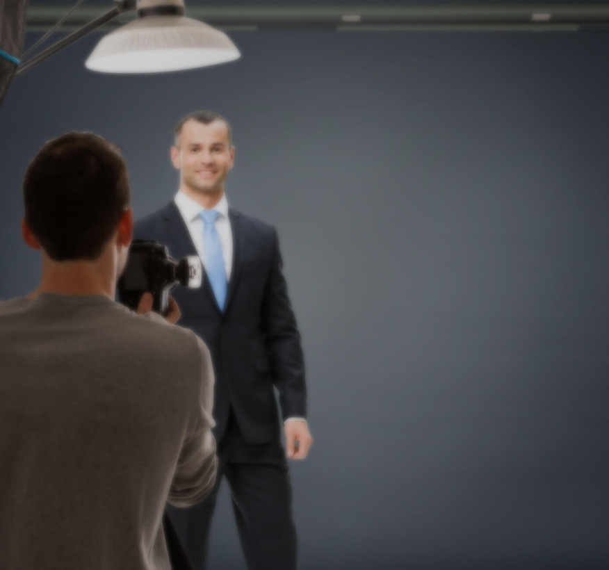 Corporate headshots photographer photographing a man in the studio, in Sydney.