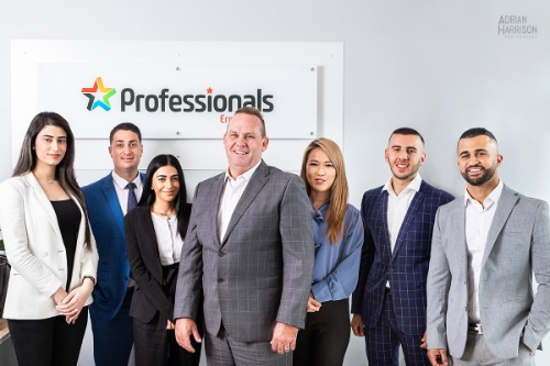 Corporate team photographer Adrian's photo of a group of professional real estate agents in Sydney's West.
