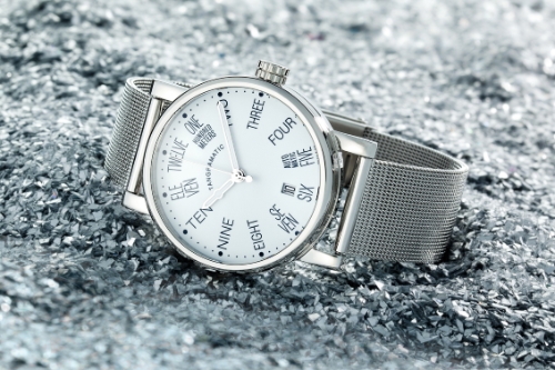Jewellery watch product photography in Newcastle. Watch on a silver glitter background.