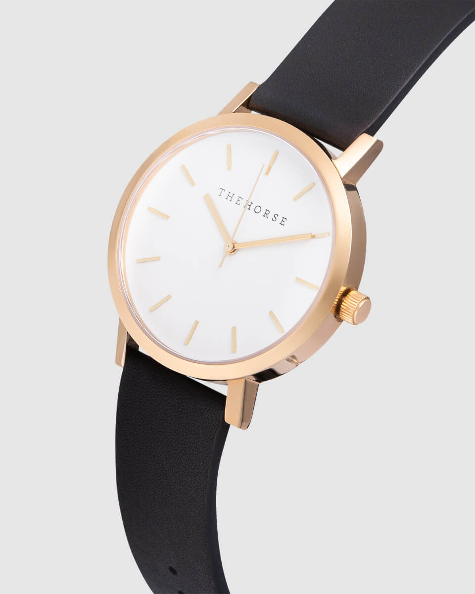 photo of a gold watch with black strap in angled view photographed by Newcastle product photographer, Adrian.