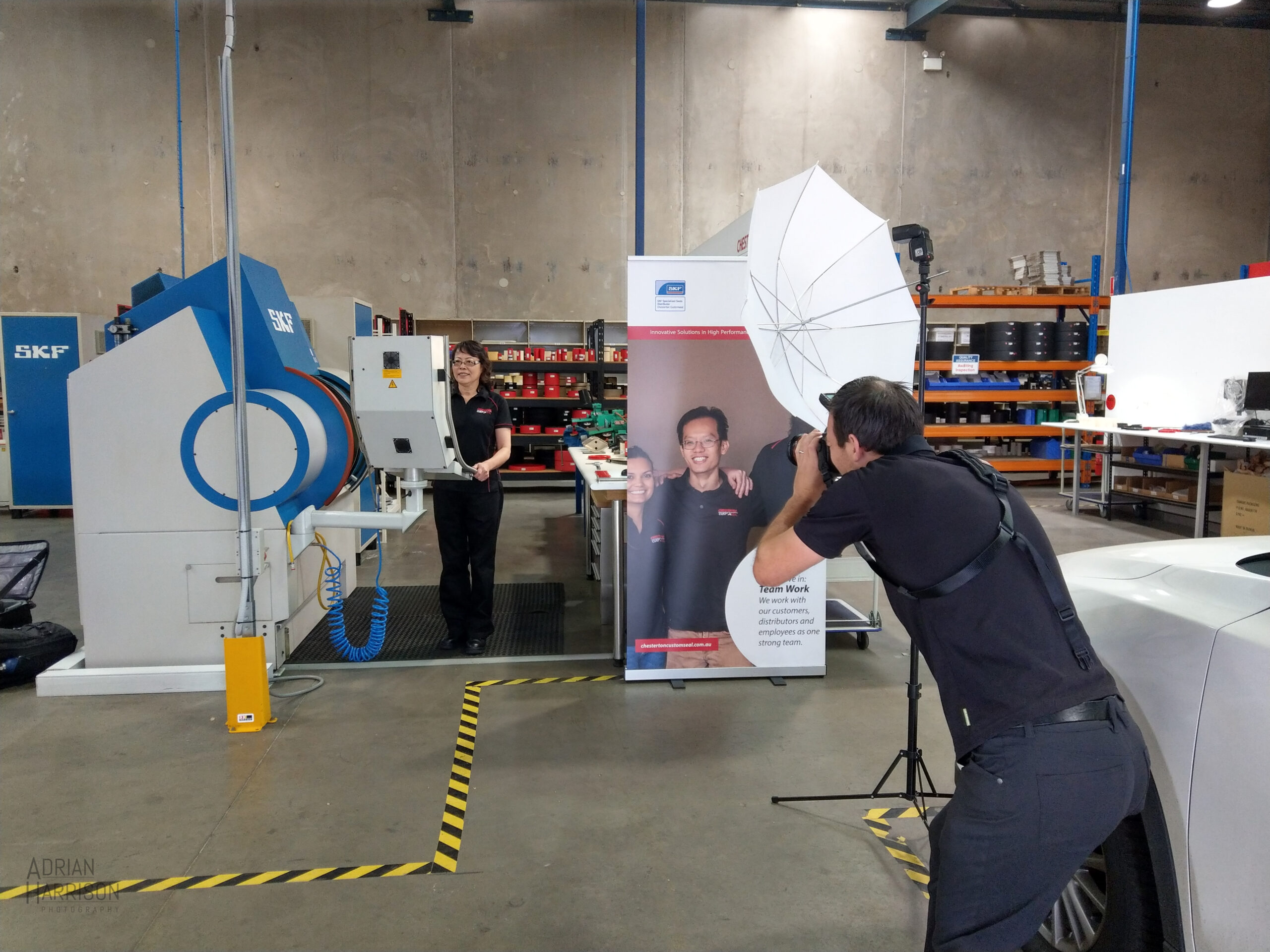 Adrian Harrison Industrial Photographer Sydney photographing lady in a factory.
