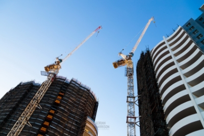 Construction photography in Castle Hill, Sydney showing two buildings in construction with tower cranes.